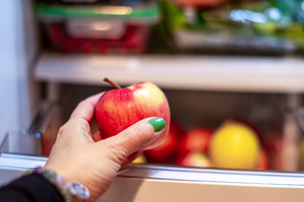 Apple in Crisper drawer of refrigerator