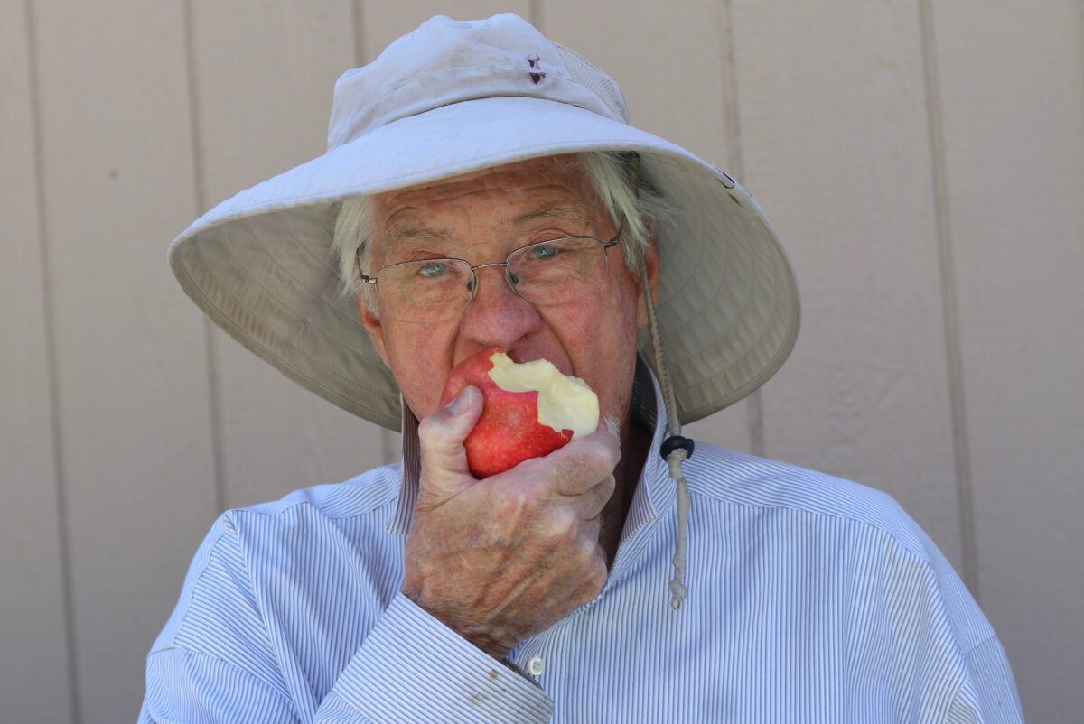 grandpa biting an apple